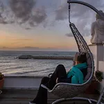 Sandhi House - Yoga & Wellness